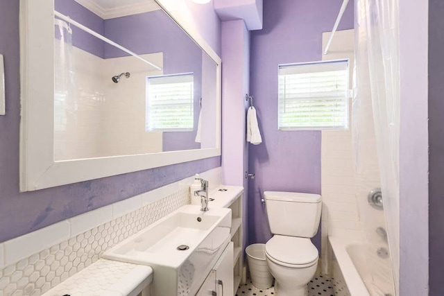 full bathroom featuring toilet, vanity, and shower / tub combo