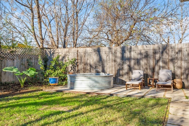 view of yard with a patio area