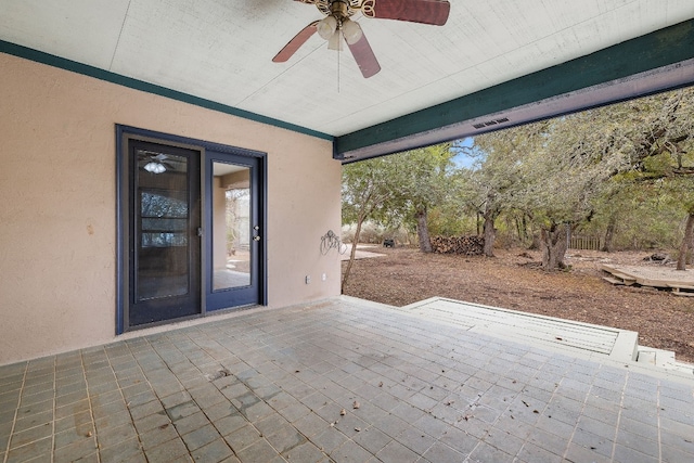 view of patio featuring ceiling fan