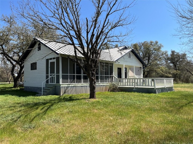 3480 Jack C Hays Trl, Buda, TX 78610 - exterior space with a lawn and a sunroom