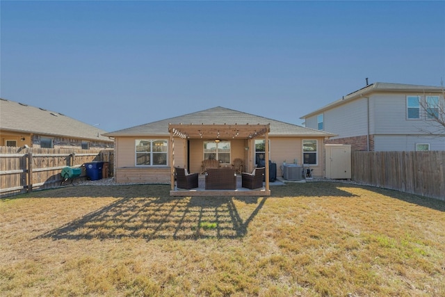 rear view of house featuring central AC unit, an outdoor living space, a pergola, and a lawn