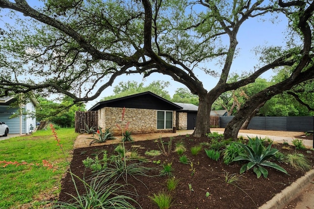 view of property exterior featuring a yard