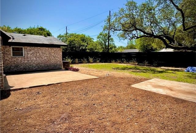 309 Rowland Dr, Austin, TX 78745 - fenced backyard featuring a patio