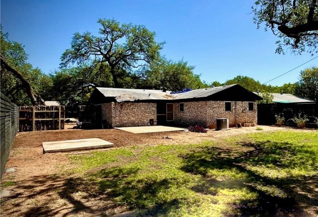 309 Rowland Dr, Austin, TX 78745 - rear view of house with a patio area