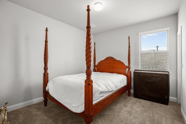 bedroom featuring carpet