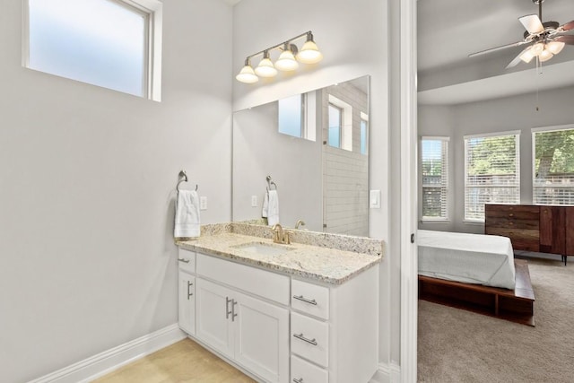 bathroom featuring vanity and ceiling fan