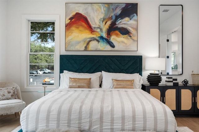 bedroom featuring hardwood / wood-style flooring