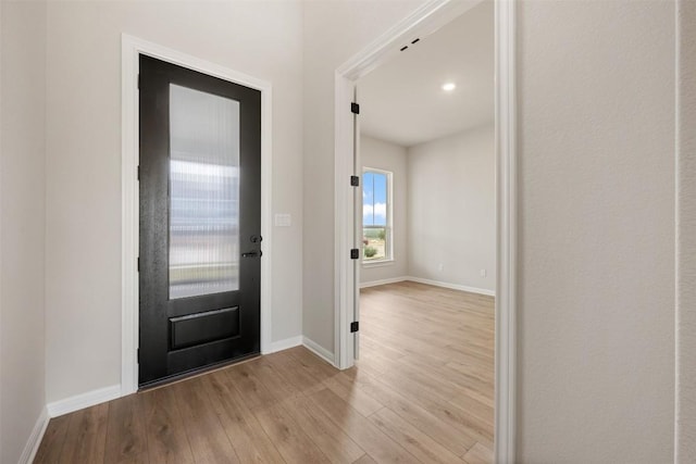 foyer with light wood-type flooring