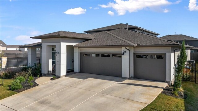 prairie-style house with a garage