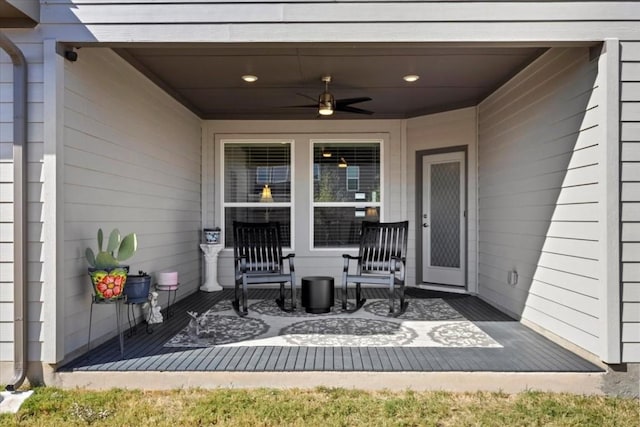 doorway to property featuring ceiling fan