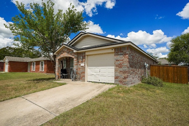 ranch-style house featuring a front lawn and a garage