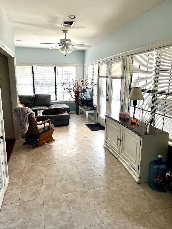 living room featuring ceiling fan