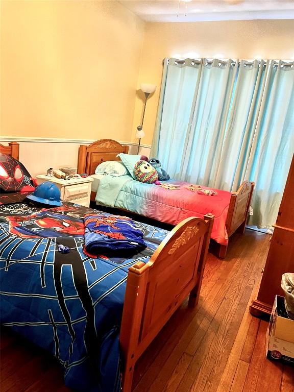 bedroom featuring hardwood / wood-style flooring