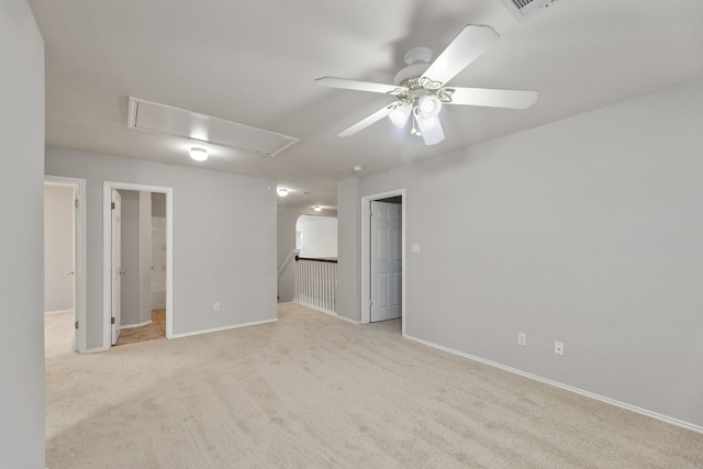 unfurnished room with light carpet and ceiling fan