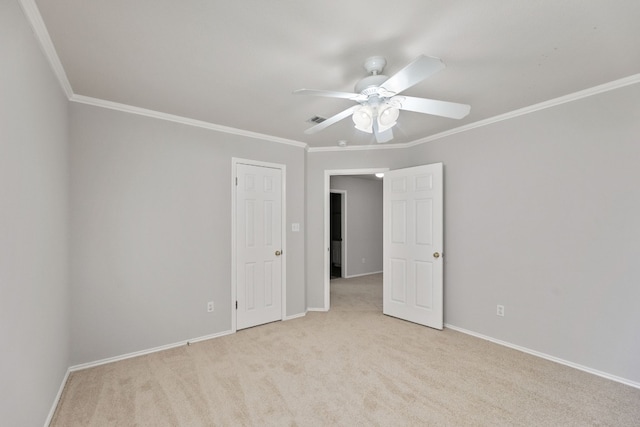30004 Oakland Hills Dr, Georgetown, TX 78628 - unfurnished bedroom with ornamental molding, light carpet, and a ceiling fan