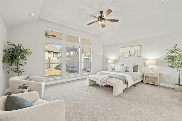 bedroom featuring ceiling fan, carpet floors, and lofted ceiling