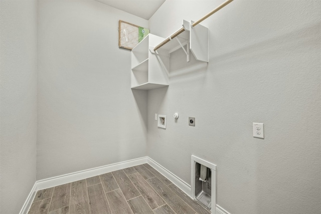 washroom featuring gas dryer hookup, hookup for a washing machine, and hookup for an electric dryer