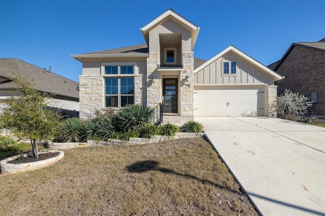 view of front of home featuring a garage and a front lawn