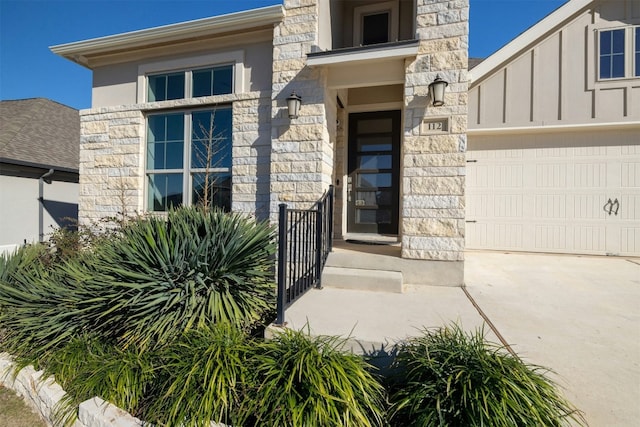 doorway to property featuring a garage