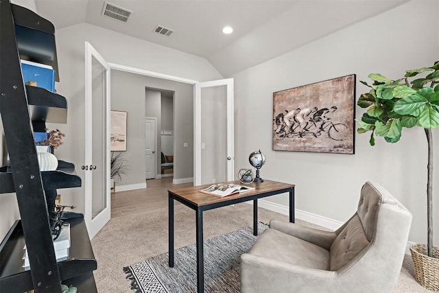 office area featuring french doors and lofted ceiling