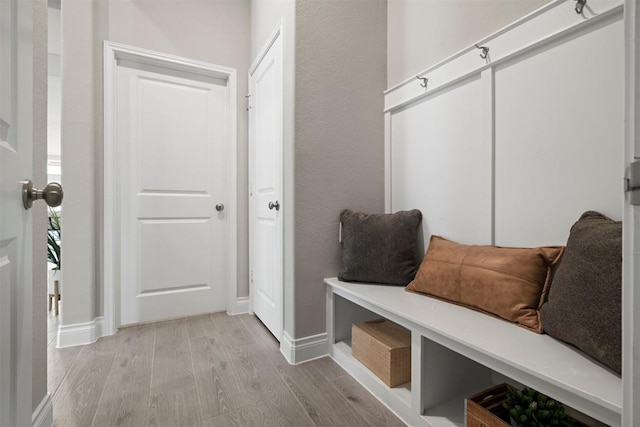 mudroom with light wood-type flooring