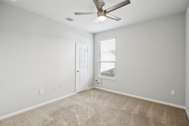 unfurnished room with carpet floors and ceiling fan