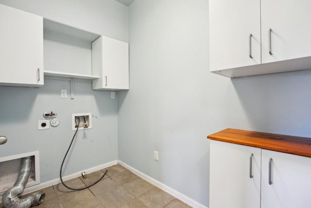 laundry area with hookup for an electric dryer, gas dryer hookup, cabinets, and hookup for a washing machine