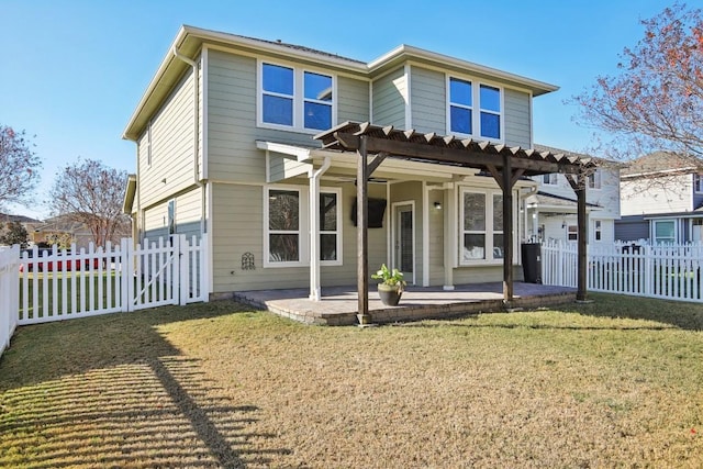 back of property featuring a pergola, a patio area, and a lawn