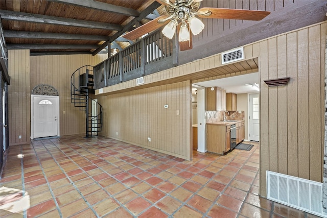 view of patio / terrace with ceiling fan and sink