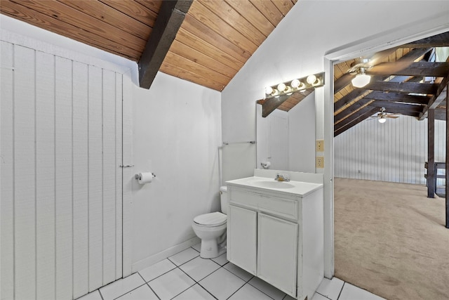 bathroom featuring vanity, lofted ceiling, wooden ceiling, tile patterned flooring, and toilet