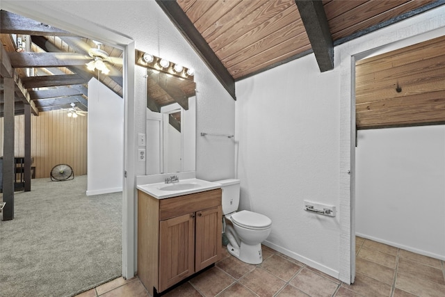 bathroom with wood ceiling, vanity, ceiling fan, toilet, and lofted ceiling