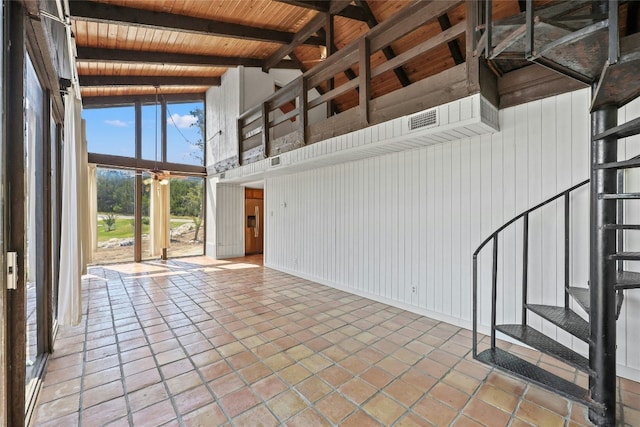 unfurnished living room featuring beam ceiling, tile patterned floors, high vaulted ceiling, and wooden ceiling