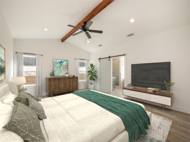 bedroom featuring ensuite bath, hardwood / wood-style flooring, ceiling fan, a barn door, and vaulted ceiling with beams