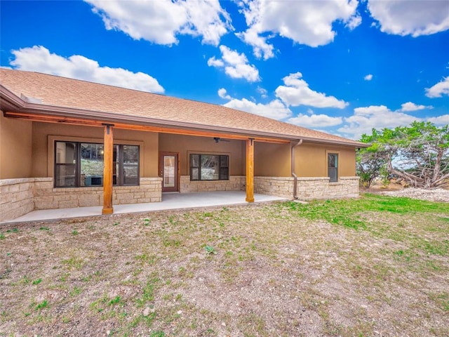 rear view of house featuring a patio