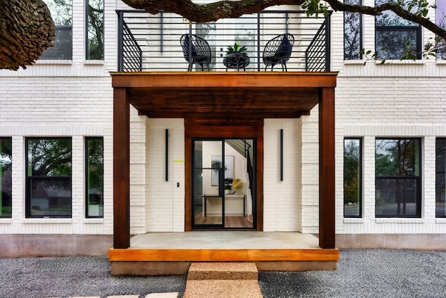 property entrance with a balcony