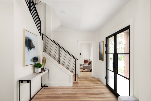 entrance foyer with light wood-type flooring