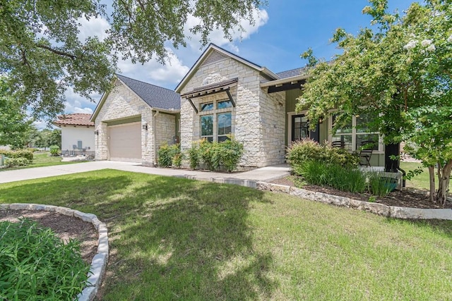 view of front facade featuring a front yard and a garage