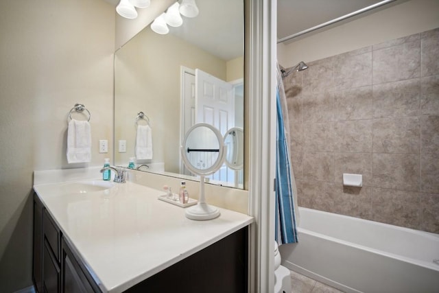 bathroom featuring tile patterned floors, shower / tub combo with curtain, and vanity