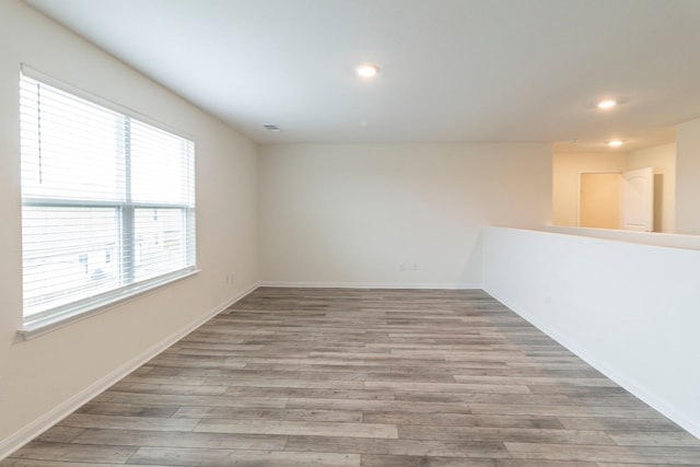 empty room featuring light hardwood / wood-style floors