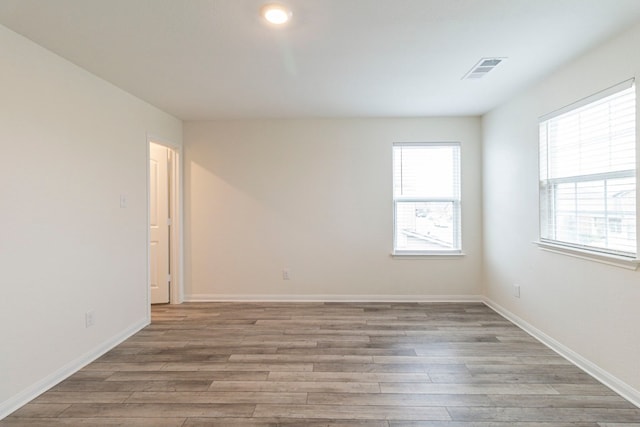 empty room featuring light hardwood / wood-style floors