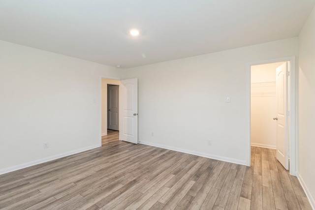 empty room with light wood-type flooring