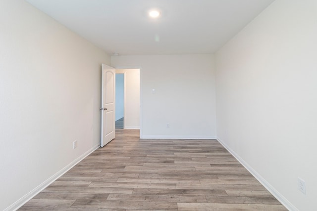 empty room with light wood-type flooring