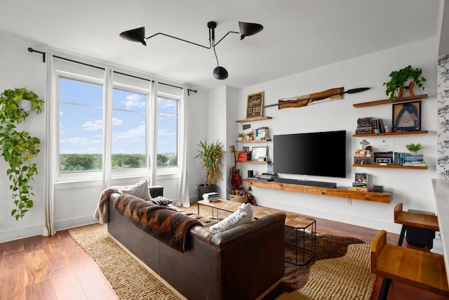 living room with light hardwood / wood-style flooring