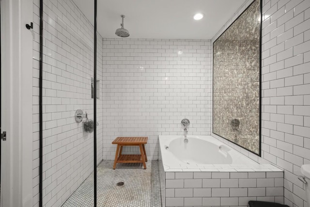 bathroom featuring tile patterned flooring, independent shower and bath, tile walls, and toilet