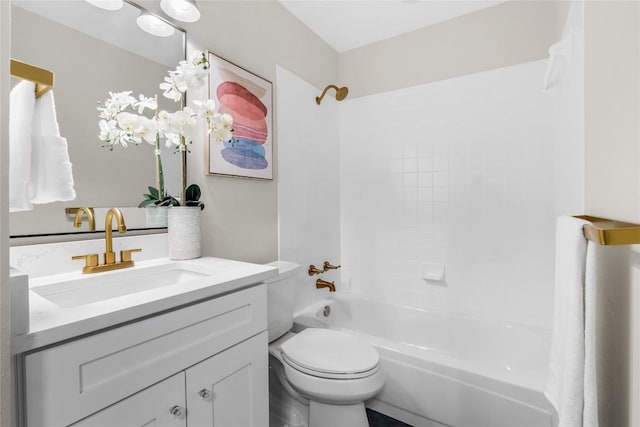 full bathroom featuring shower / bathing tub combination, vanity, and toilet