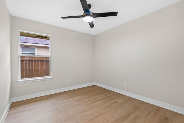 unfurnished room featuring light hardwood / wood-style floors and ceiling fan