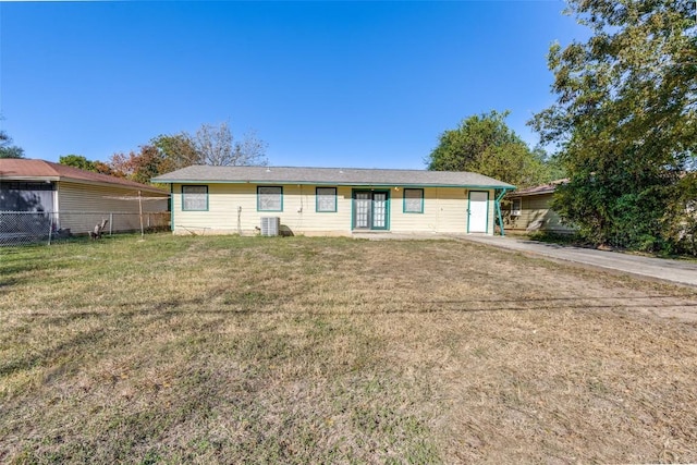 single story home with a front lawn and cooling unit