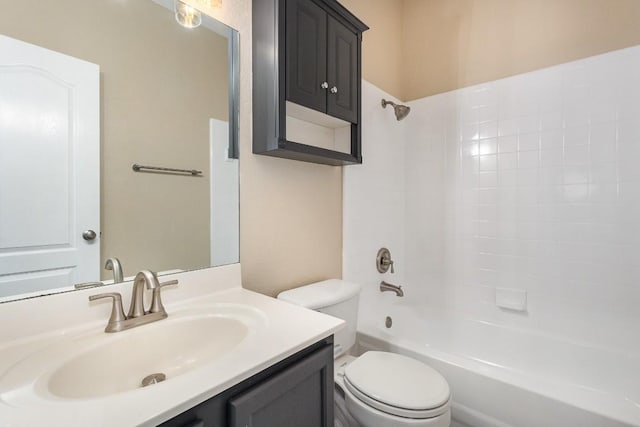 full bathroom featuring vanity, toilet, and shower / tub combination