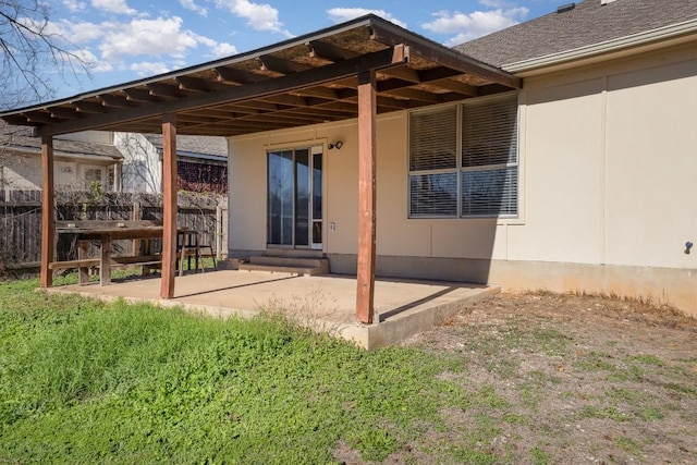 back of house featuring a patio area