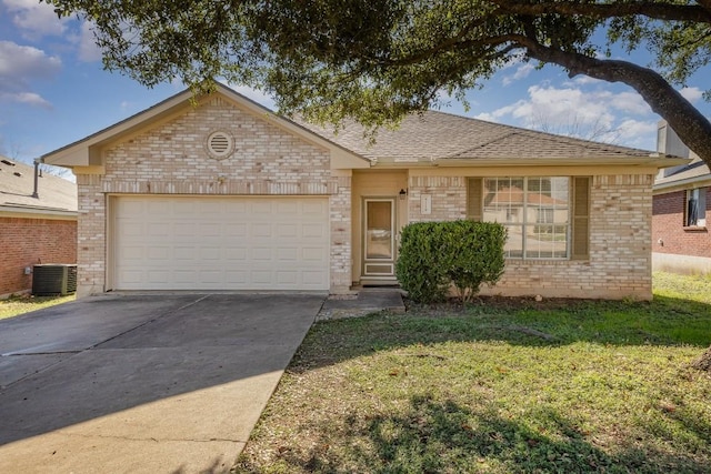 single story home with a garage, central air condition unit, and a front lawn